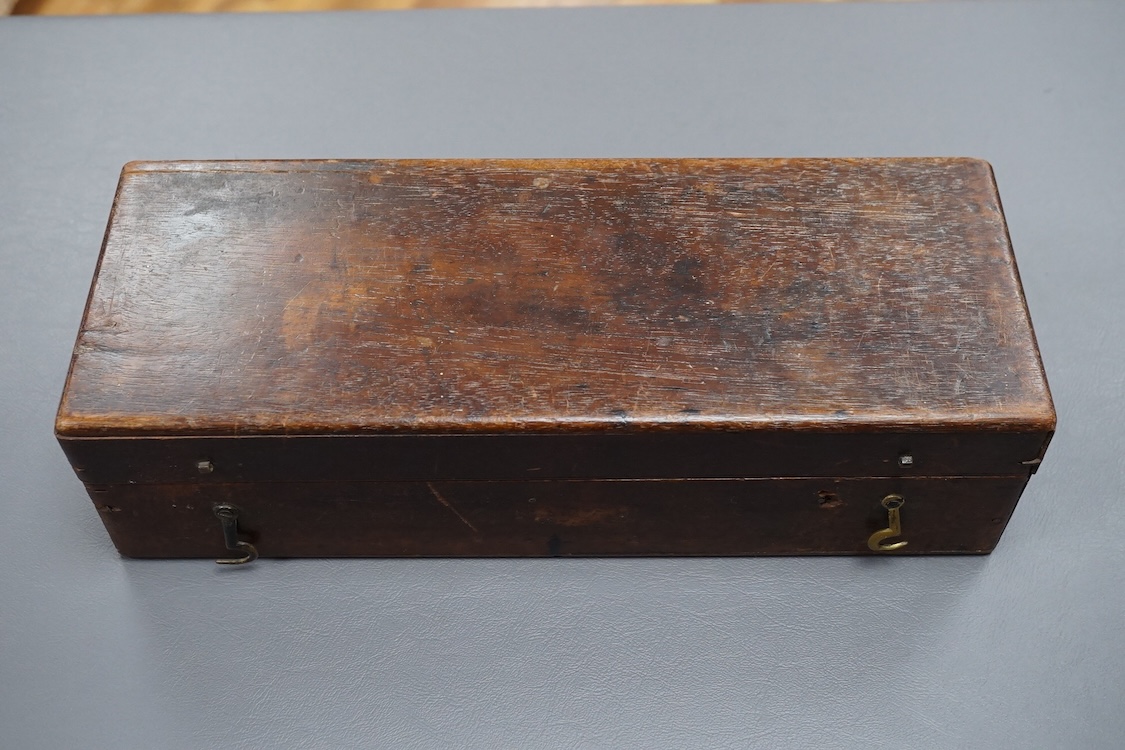 A 19th century mahogany cased brass Corn Balance, made by Bryan Corcoran & Co., 36, Mark Lane, London, with engraved scale and sliding balance marked with; ‘Lbs Per Bushel’, in its original fitted case with paper label t